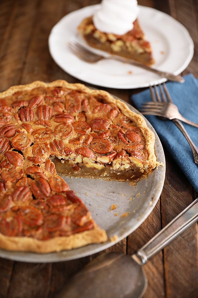 The Best Southern Pecan Pie with a slice missing