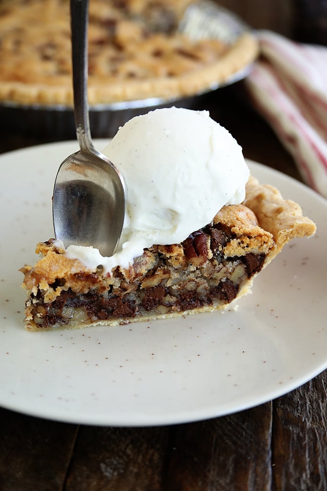 Kentucky Pecan Pie sliced with whipped topping