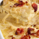 Spoonful of smothered chicken.