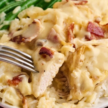 Piece of Easy Smothered Chicken on fork.