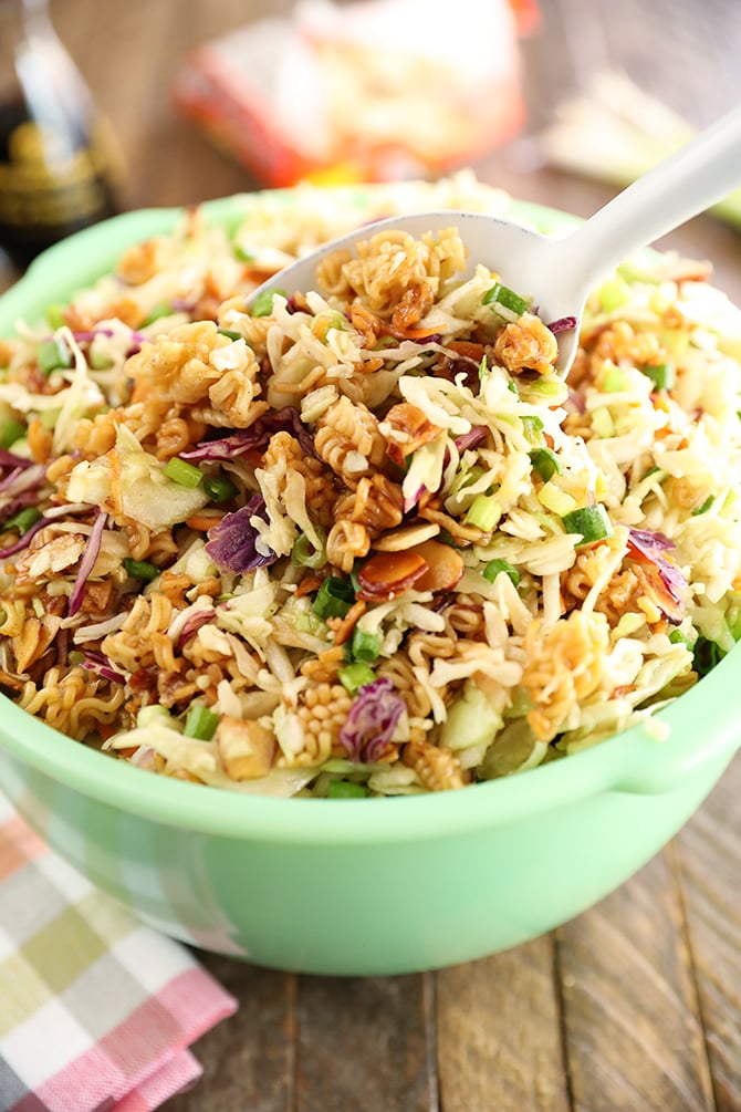 Scoop of Asian Inspired Ramen Slaw in a green bowl