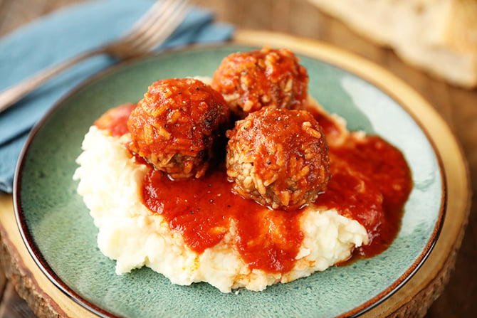 Porcupine Meatballs served over mashed potatoes