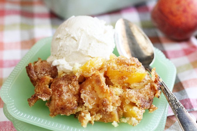 Peach Cobbler with scoop of ice cream on top