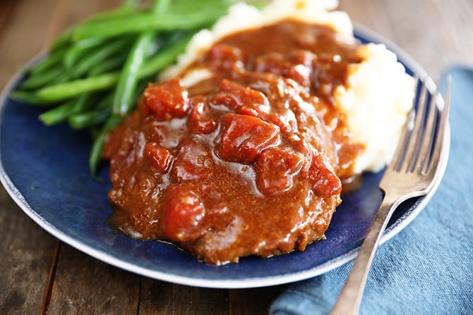 Easy Swiss Steak on plate with mashed potatoes