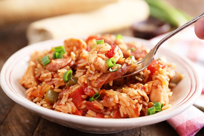 Chicken and Sausage Jambalaya scooping bite with fork