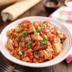 Chicken and Sausage Jambalaya with bread sticks in background