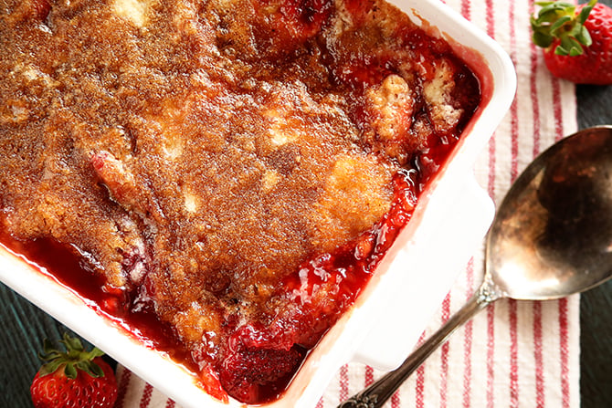 Strawberry Cobbler in white serving dish