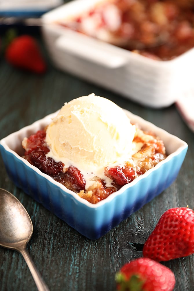 Bowl of Strawberry Cobbler with ice cream on top