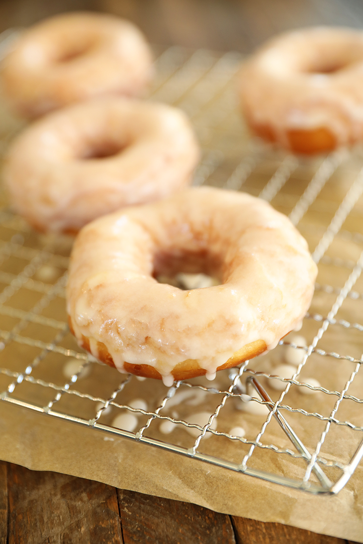 Glazed doughnut on rack.
