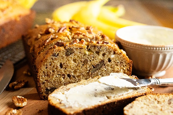Sliced Banana bread with butter.