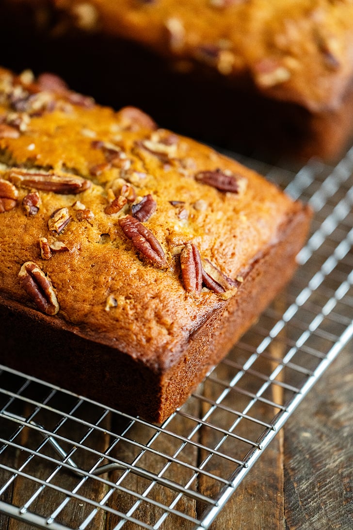 Sliced Banana bread loaves on cooling rack.
