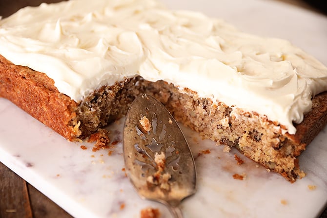 Hummingbird Sheet Cake with pieces missing