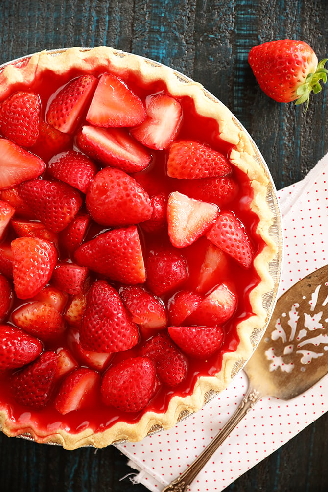 Strawberry pie with serving spoon