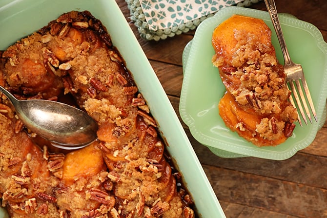 Dish of Candied Sweet Potatoes with Brown Sugar and Pecans