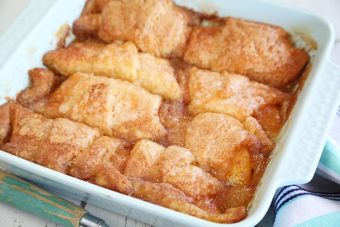 Peach dumplings in baking dish