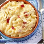 Mac and Cheese Soup with Chicken and bacon in blue bowl