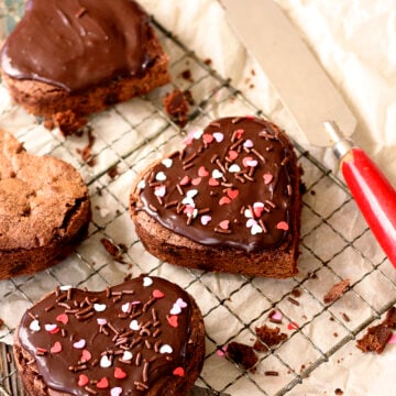 Heart-shaped brownies with chocolate ganache frosting.