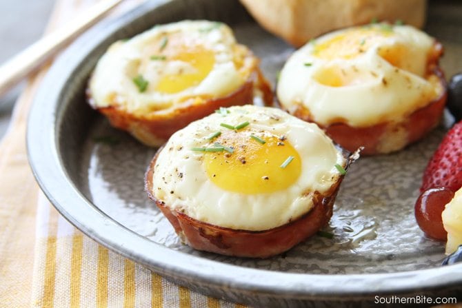 These Baked Ham and Pimento Cheese Egg Cups are a favorite with my family! They're easy enough for a busy weekday breakfast, but look fancy enough for company!