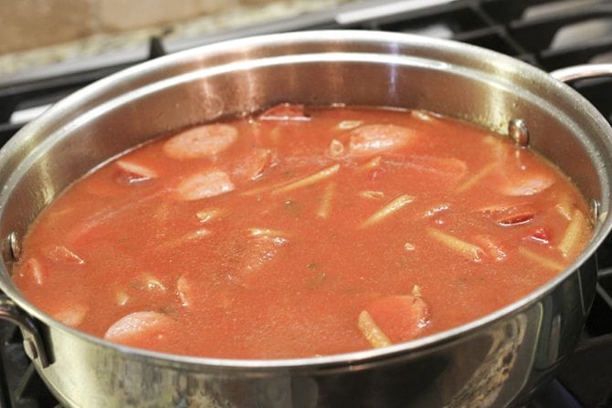 This One-Pot Cheesy Sausage Skillet only calls for 6 ingredients and is ready in no-time flat! It's perfect for a super-easy weeknight meal! 