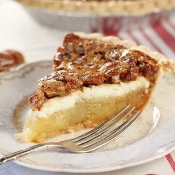 The delicious cream cheese layer in this Cream Cheese Pecan Pie really puts it over the top!