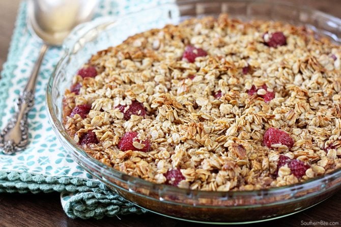 Switch up the boring breakfast routine with this amazing Raspberry Baked Oatmeal recipe! It has all the great flavor of granola and you can add your favorite berries to suit your taste!