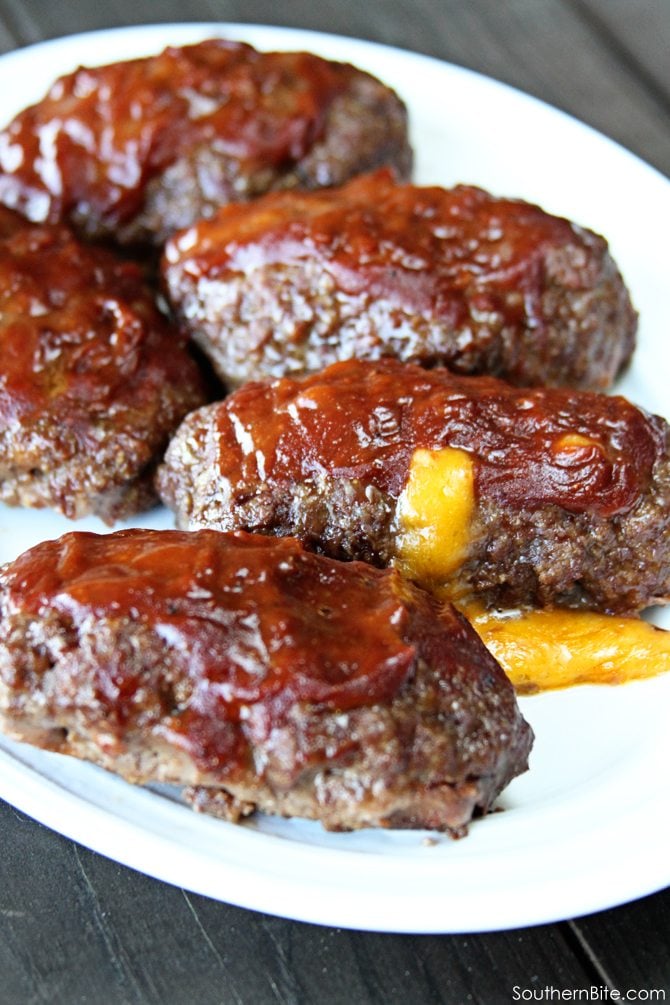 Turn your meatloaf on it's head by making it mini, grilling it, covering it with barbecue sauce, and stuffing it with cheese!