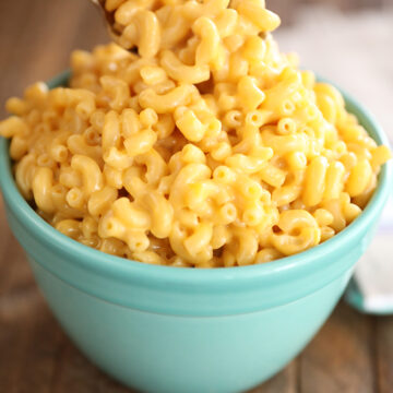 Bowl of Easiest One-Pot Mac and Cheese with scooping out