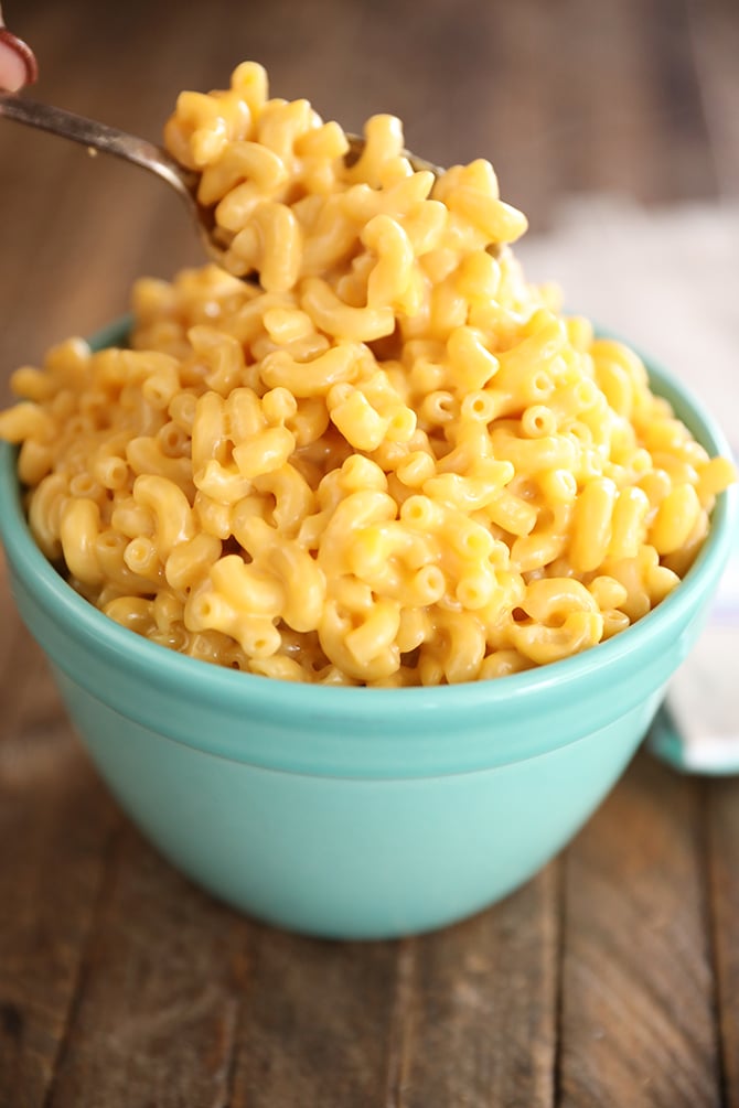 Bowl of Easiest One-Pot Mac and Cheese with scooping out