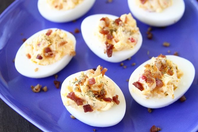 This Pimiento Cheese Deviled Eggs recipe is a fun way to put a spin on the classic dish - and they're so good!