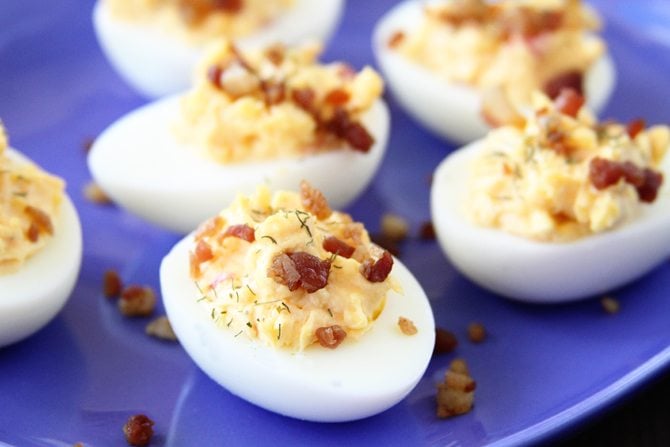 This Pimiento Cheese Deviled Eggs recipe is a fun way to put a spin on the classic dish - and they're so good!