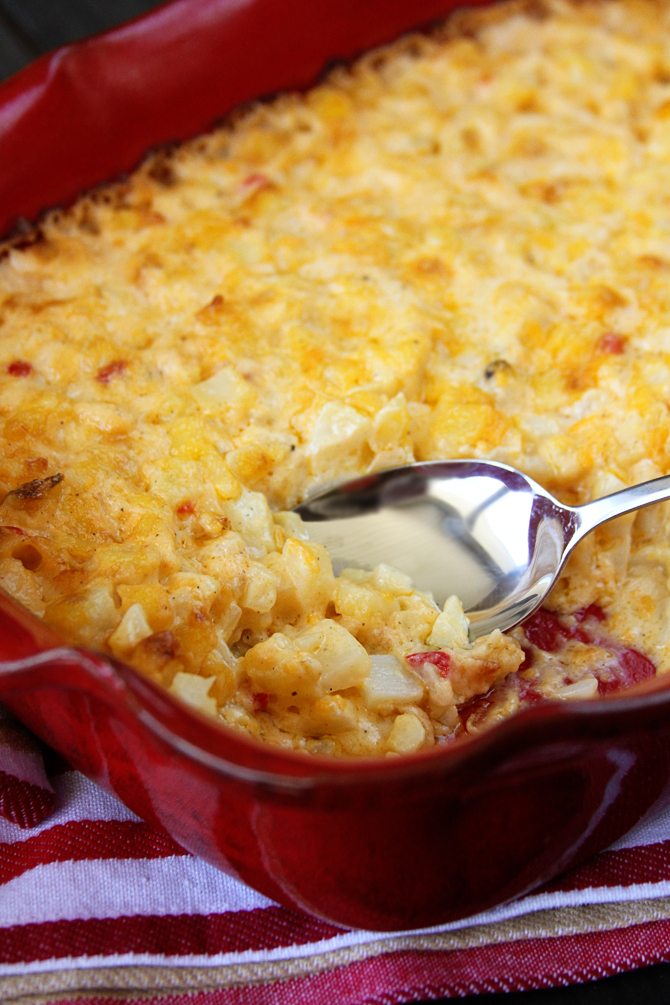 Pimento Cheese Scalloped Potatoes in a casserole dish.