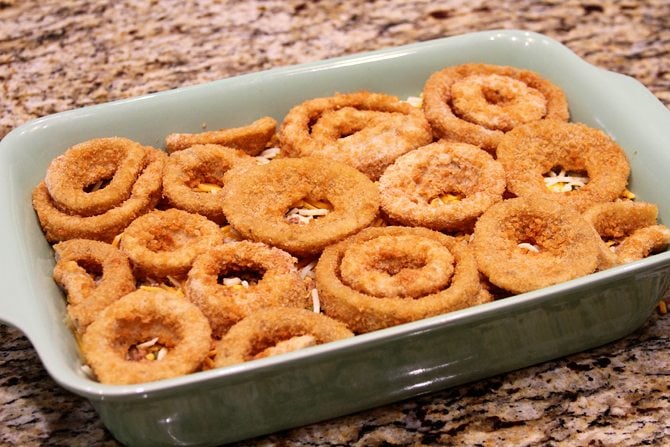 This Cheesy Beef Bake with Onion Rings is a delicious twist on the Classic Tater Tot Casserole!