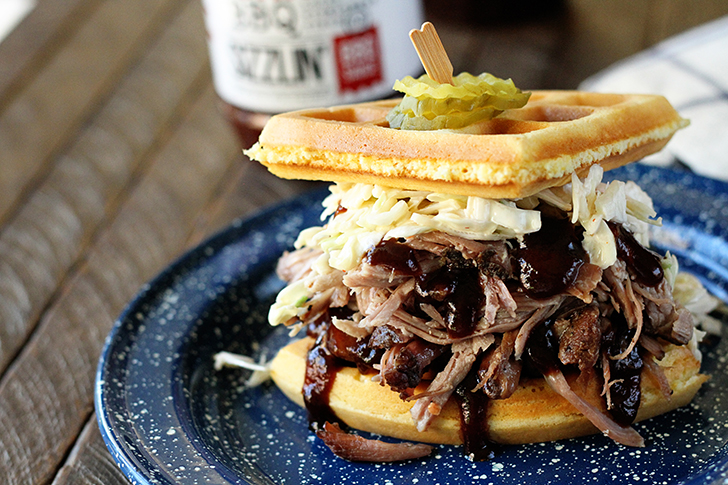 Cornbread Waffle Pulled Pork Sandwiches on a blue plate.