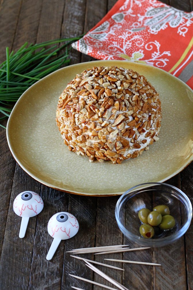 This recipe starts as a delicious Chicken Ranch Cheese Ball and is turned into a ghoulish goblin!