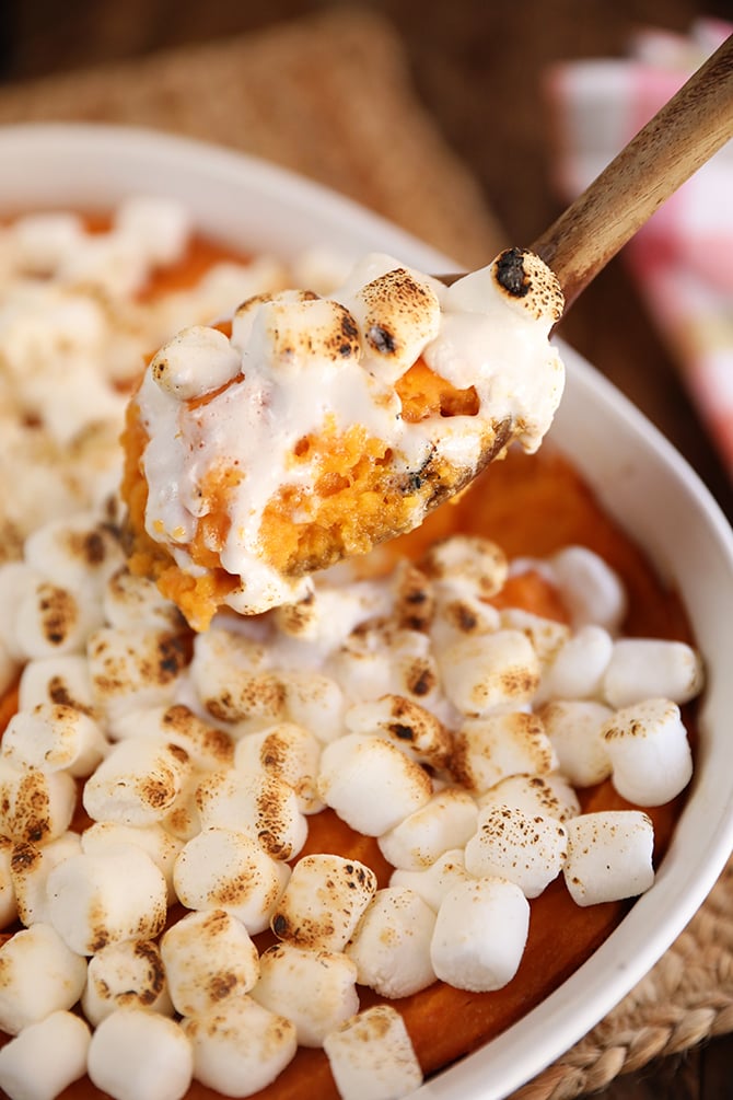 Scoop of Big Mama's Sweet Potato Pudding with melted marshmallows
