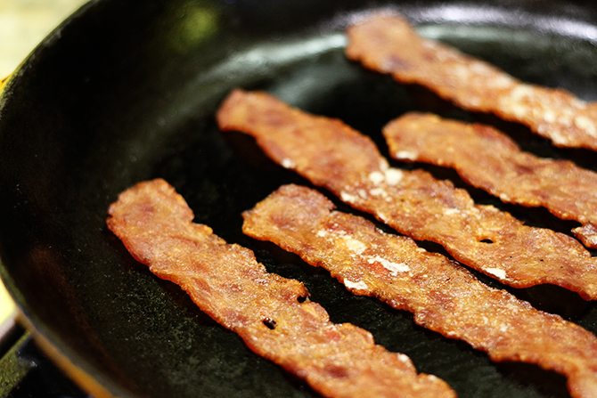 Hash browns, eggs, spinach, and chicken bacon combine to make this lightened-up version of a breakfast classic!