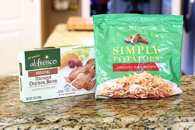 Hash browns, eggs, spinach, and chicken bacon combine to make this lightened-up version of a breakfast classic!