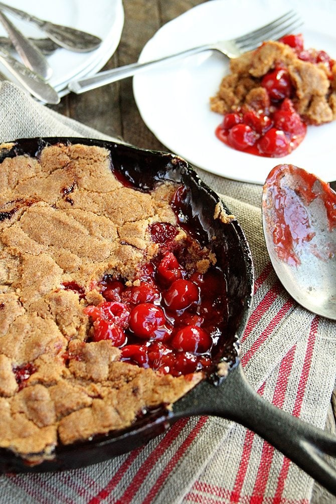 You're only 4 ingredients away from some of the best Skillet Cherry Cobbler ever! This recipe is SO easy!