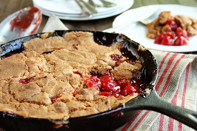 You're only 4 ingredients away from some of the best Skillet Cherry Cobbler ever! This recipe is SO easy!