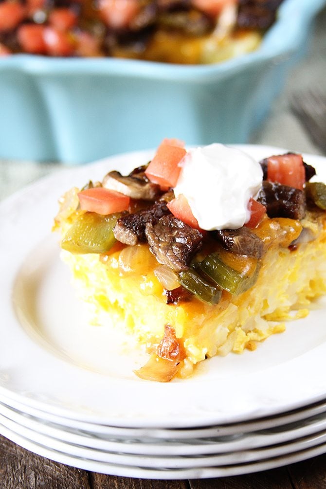 Cheese, eggs, steak, peppers, and onions combine in this Baked Big Steak Omelet!
