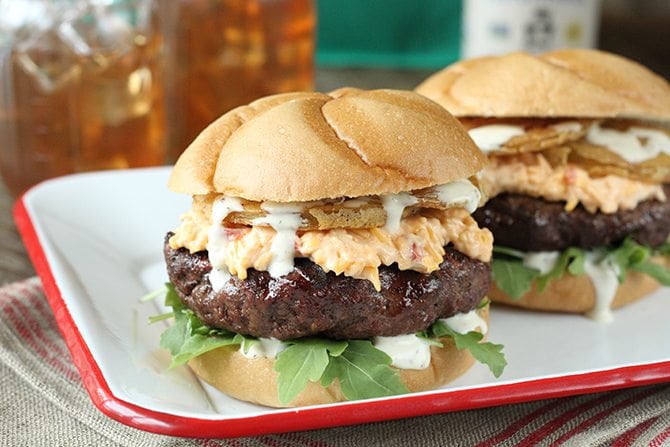 Put a little South in your mouth with this burger topped with pimiento cheese, fried green tomatoes, and Alabama White BBQ Sauce!