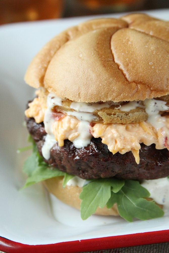 Put a little South in your mouth with this burger topped with pimiento cheese, fried green tomatoes, and Alabama White BBQ Sauce!