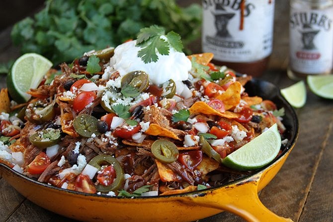 The Slow Cooker does all the hard work with these amazingly delicious LOADED Brisket Nachos!