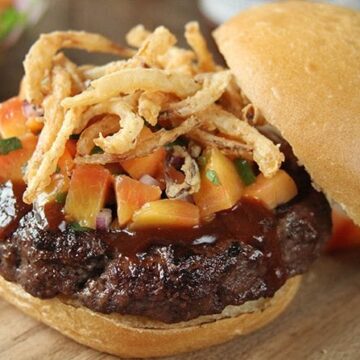 Top this sweet and sticky pork burger with homemade peach salsa for an unexpected kick!