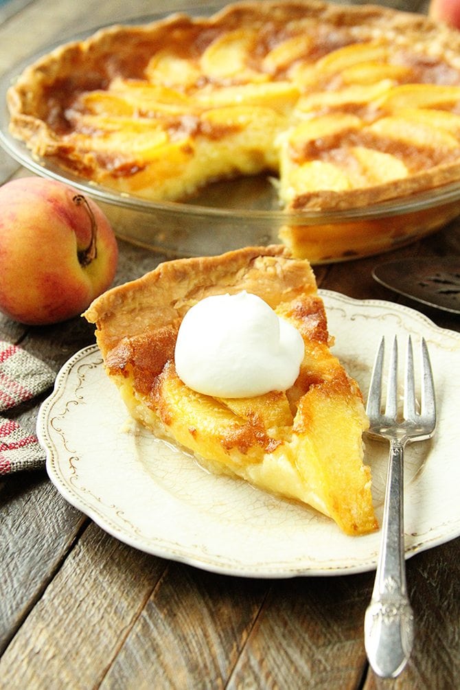 This Peach Chess Pie combines all the flavor of delicious peach cobbler in a decadent custard pie! 