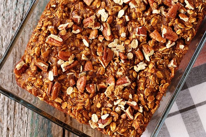 Overhead view of Pumpkin Pecan Baked Oatmeal in baking dish. 
