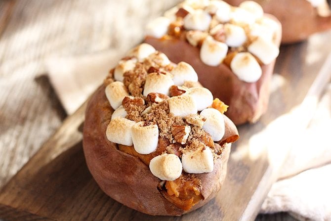 This Twice Baked Sweet Potato recipe combines the flesh of a sweet potato with butter, cream cheese, cinnamon, brown sugar, and pecans and tops them with marshmallows.