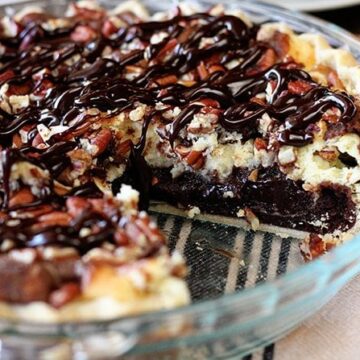 This fudgy top-prize winning Cream Cheese Brownie Pie needs nothing more than an ice-cold glass of milk to make a perfect ending to any meal.