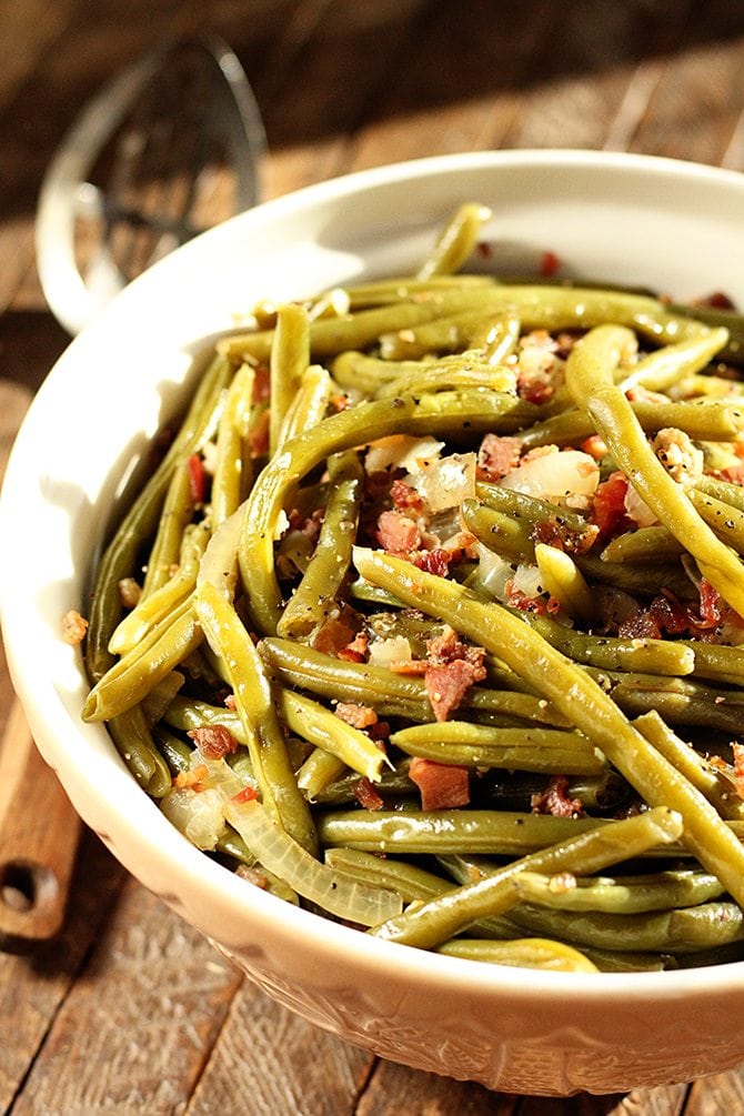 Free up space on the cooktop and make these easy Southern Green Beans right in the slow cooker! They're so easy!