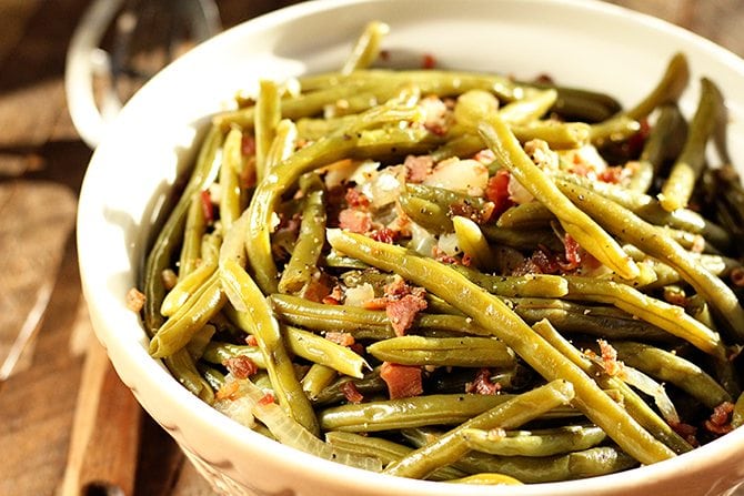 Free up space on the cooktop and make these easy Southern Green Beans right in the slow cooker! They're so easy!